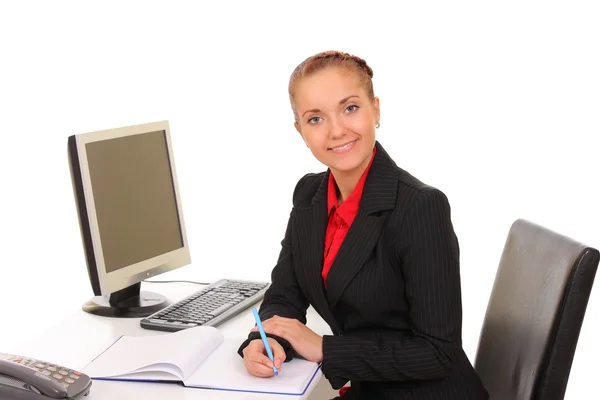 Junge Geschäftsfrau am Arbeitsplatz — Stockfoto