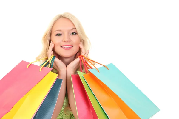 Beautiful woman with a shopping bags. Isolated on white. — Stock Photo, Image