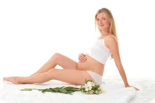 Young pregnant woman touching her belly — Stock Photo, Image