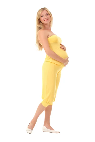 Jeune femme enceinte touchant son ventre — Photo