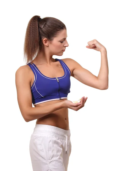 Frau mit Tabletten in der Hand — Stockfoto