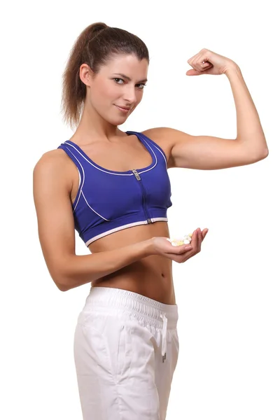 Frau mit Tabletten in der Hand — Stockfoto