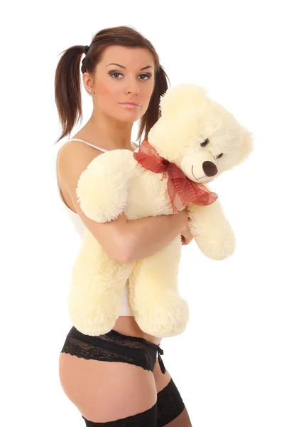 在与一只泰迪熊内衣性感的女孩 — 图库照片