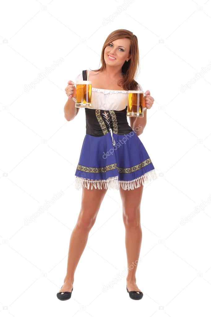 Young and beautiful bavarian girl isolated over white background