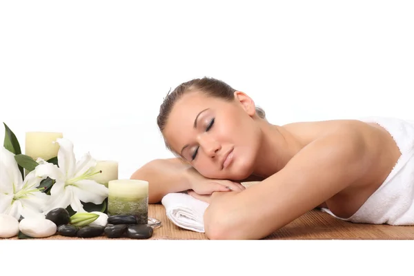 Beautiful girl relaxing in the spa. isolated on white — Stock Photo, Image