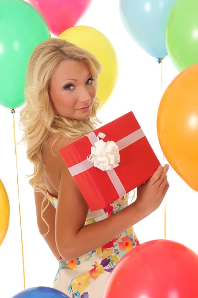 Beautiful girl holding gifts — Stock Photo, Image