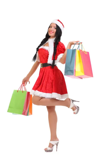 Kerstmis, geschenk. Gelukkige vrouw met shopping tassen. — Stockfoto