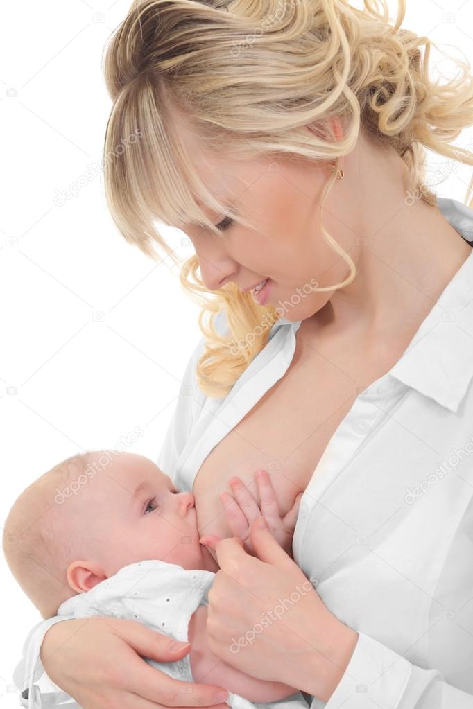 mother breast feeding and hugging her baby