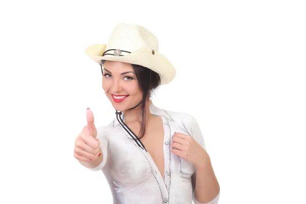 Дівчина в ковбойському капелюсі показує як — стокове фото