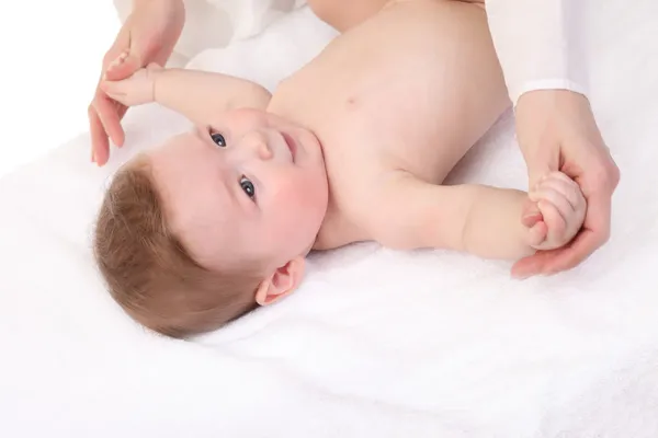Baby massage. Mother massaging kid — Stock Photo, Image