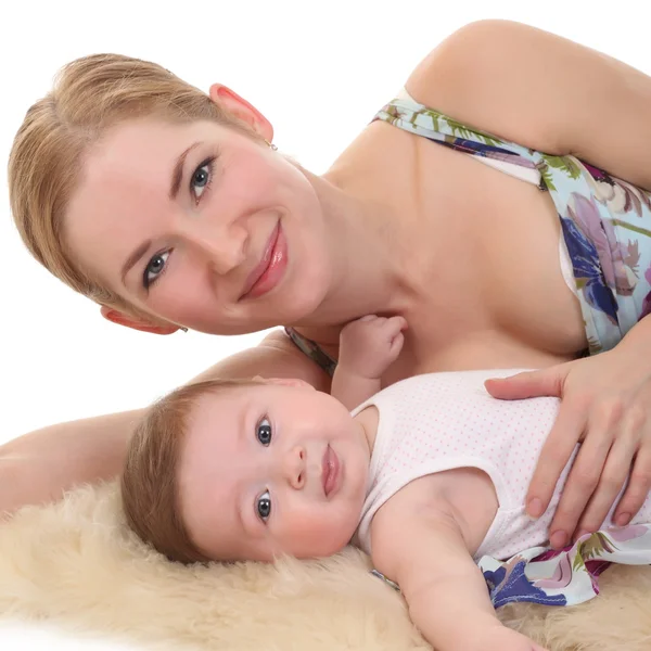 Une jeune mère et son bébé — Photo