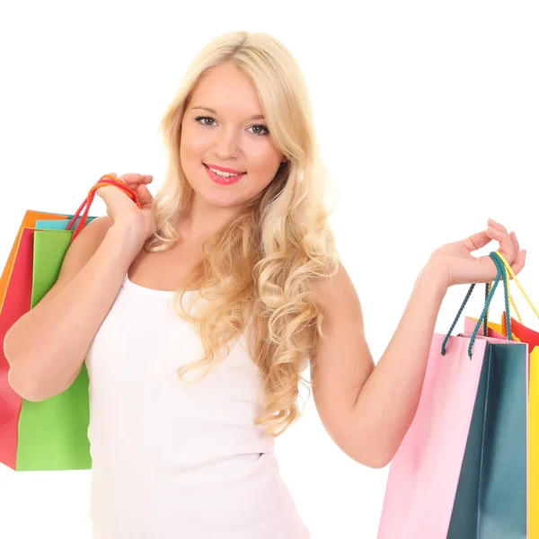 Krásná mladá žena s barevnými nákupní tašky — Stock fotografie