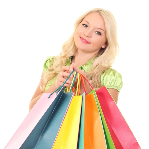 Lächelndes Mädchen mit Einkaufstüten — Stockfoto