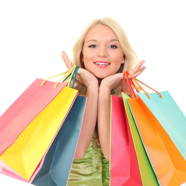 Mooie jonge vrouw met gekleurde shopping tassen — Stockfoto