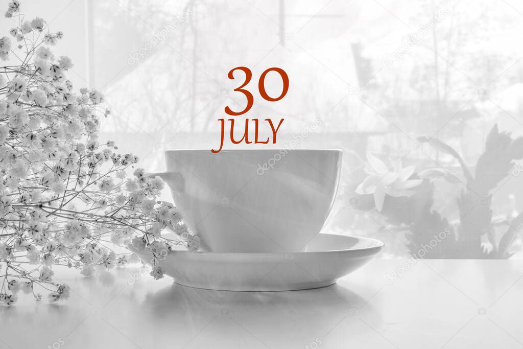 calendar date on light background with porcelain white tea pair and white gypsophila with copy space. July 30 is the thirtieth day of the month.