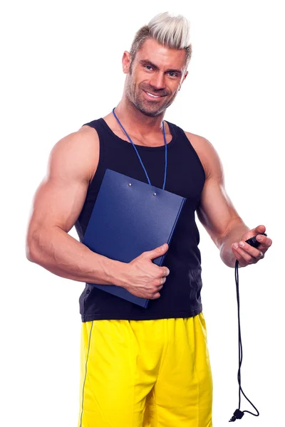 Personlig tränare, med en pad i sin hand, isolerade i vitt — Stockfoto