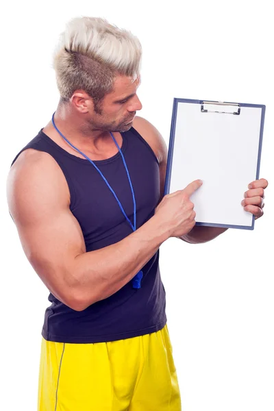 Προσωπικό γυμναστή, με ένα μαξιλάρι στο χέρι του, απομονωθεί σε λευκό — Φωτογραφία Αρχείου