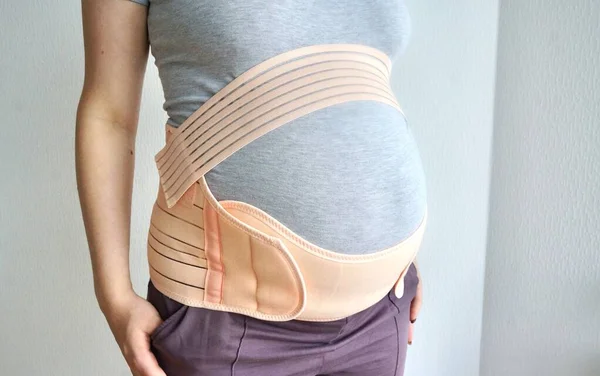 A bandage for a pregnant woman. Abdominal support for 8-9 months of pregnancy, no back pain. Special elastic waistband for pregnant women.