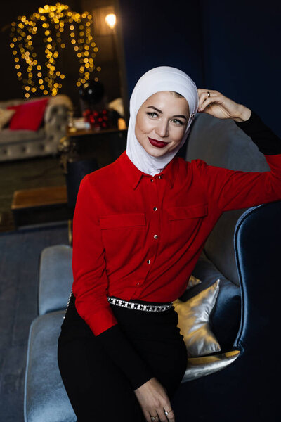 Muslim woman near christmas decoration in studio. Professional muslim model posing at the new year eve. — Stock Image Muslim Woman Christmas Decoration Studio Professional Muslim Model Posing New Royalty Free Stock Images