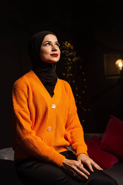 Muslim woman in black hijab near new year tree waiting for celebration of Christmas. Islam religion — Stock Image Muslim Woman Black Hijab New Year Tree Waiting Celebration Christmas Royalty Free Stock Images