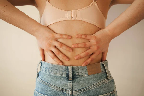 Kidney infection pyelonephritis urinary tract infection. Attractive woman feel backache spine pain because of UTI pyelonephritis disease