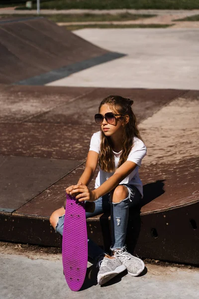 Child Penny Board Young Girl Teenager Glasses Skate Board Sitting — Stok fotoğraf