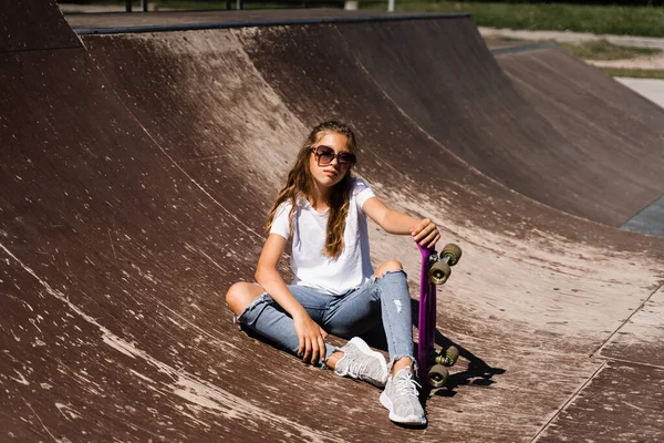 Child Model Glasses Sitting Posing Penny Board Skate Playground Active — Foto de Stock