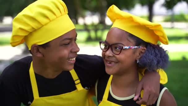 Video Black African Cooks Children Grimacing Smiling Yellow Chefs Hat — Stock Video