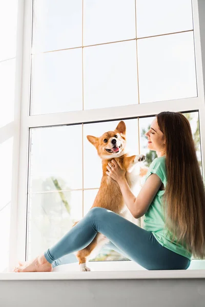 Happy Girl Hug Corgi Dog Home Lifestyle Domestic Pet Young — Fotografia de Stock