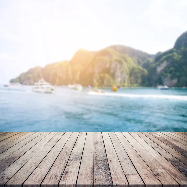 empty wooden table with river background