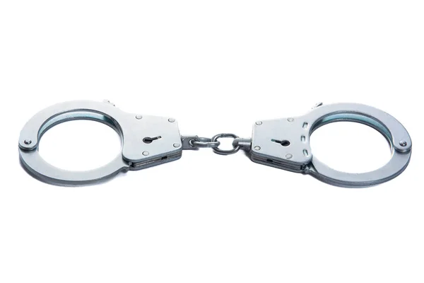 Metal handcuffs on a white isolated background — Stock Photo, Image