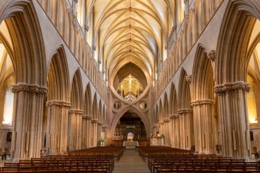 Wells.Somerset.United Kingdom.December 30th 2021.View of the nave and the  scissor arches  inside Wells cathedral in Somerset