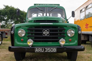 West Bay.Dorset.United Kingdom.June 12th 2022.A Commer Superpoise flatbed truck from 1964 is on display at the West Bay vintage rally