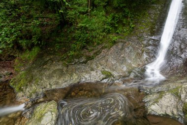 Long exposure of the White Lady waterfall on the river Lyd at Lyford Gorge in Devon