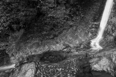 Long exposure of the White Lady waterfall on the river Lyd at Lyford Gorge in Devon