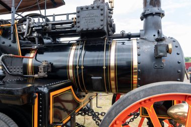 West Bay.Dorset.United Kingdom.June 12th 2022.A restored Mclaren traction engine is on display at the West Bay vintage rally