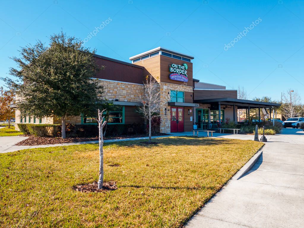 Kissimmee, Florida - February 6, 2022: Closeup View of Cicis Pizza Restaurant Building Exterior with Flowing Waterfalls in Orlando, FL. Cici's Pizza is a Family-friendly Retail Restaurant Chain.