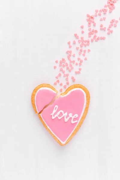 Broken Heart Shaped Cookie Text Love Falling Comet Top View — Stock Photo, Image