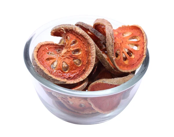 Dried bael fruit in glass bowl — Stock Photo, Image