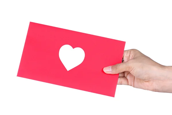 Main tenant enveloppe rouge avec à Symbole, concept d'Amour — Photo