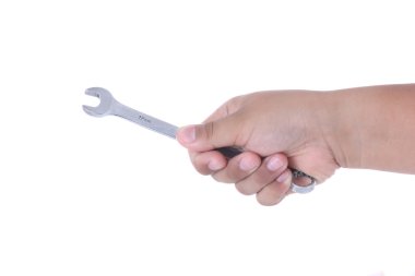 İngiliz anahtarını tutan el.