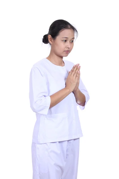 Mulher bonita de pé em posição de oração, meditando — Fotografia de Stock