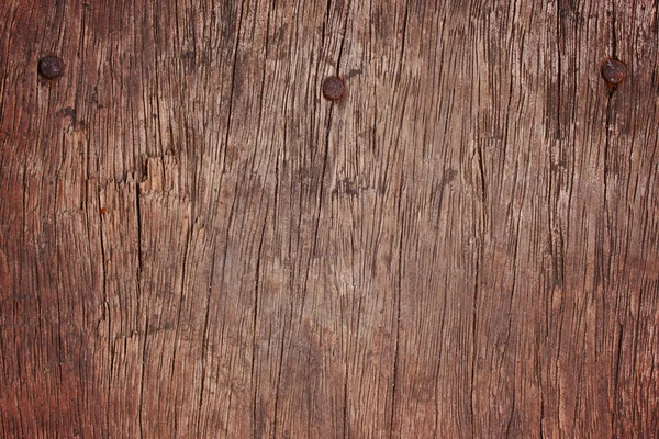 Textura de madeira marrom e unhas — Fotografia de Stock