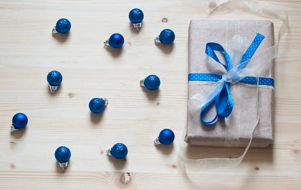 Blue cristmas balls and gift — Stock Photo, Image