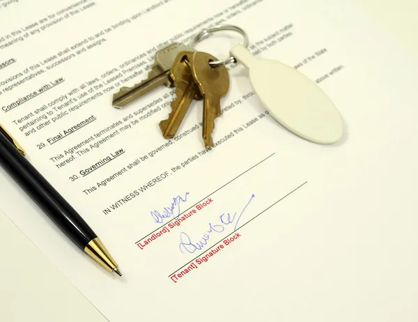 Signed rental application document — Stock Photo, Image