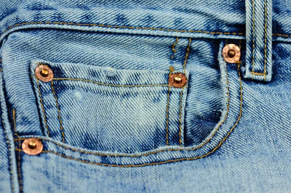 Coin pocket of a blue stylish jeans — Stock Photo, Image