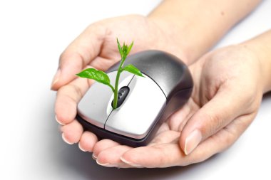 Hands holding a tree growing on a mouse clipart