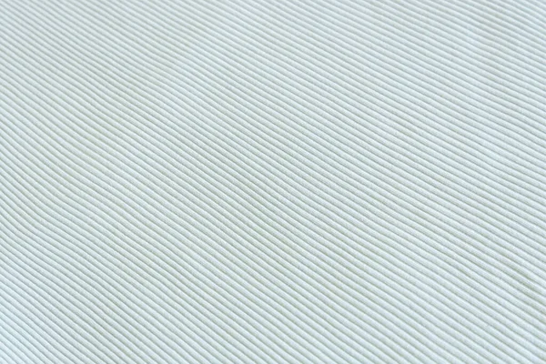 Vert clair, bleu, menthe montrent la texture de la vague de tissu de coton côtelé. Ferme là. Vêtements et textiles en coton. Texture naturelle des tissus bio lumière — Photo