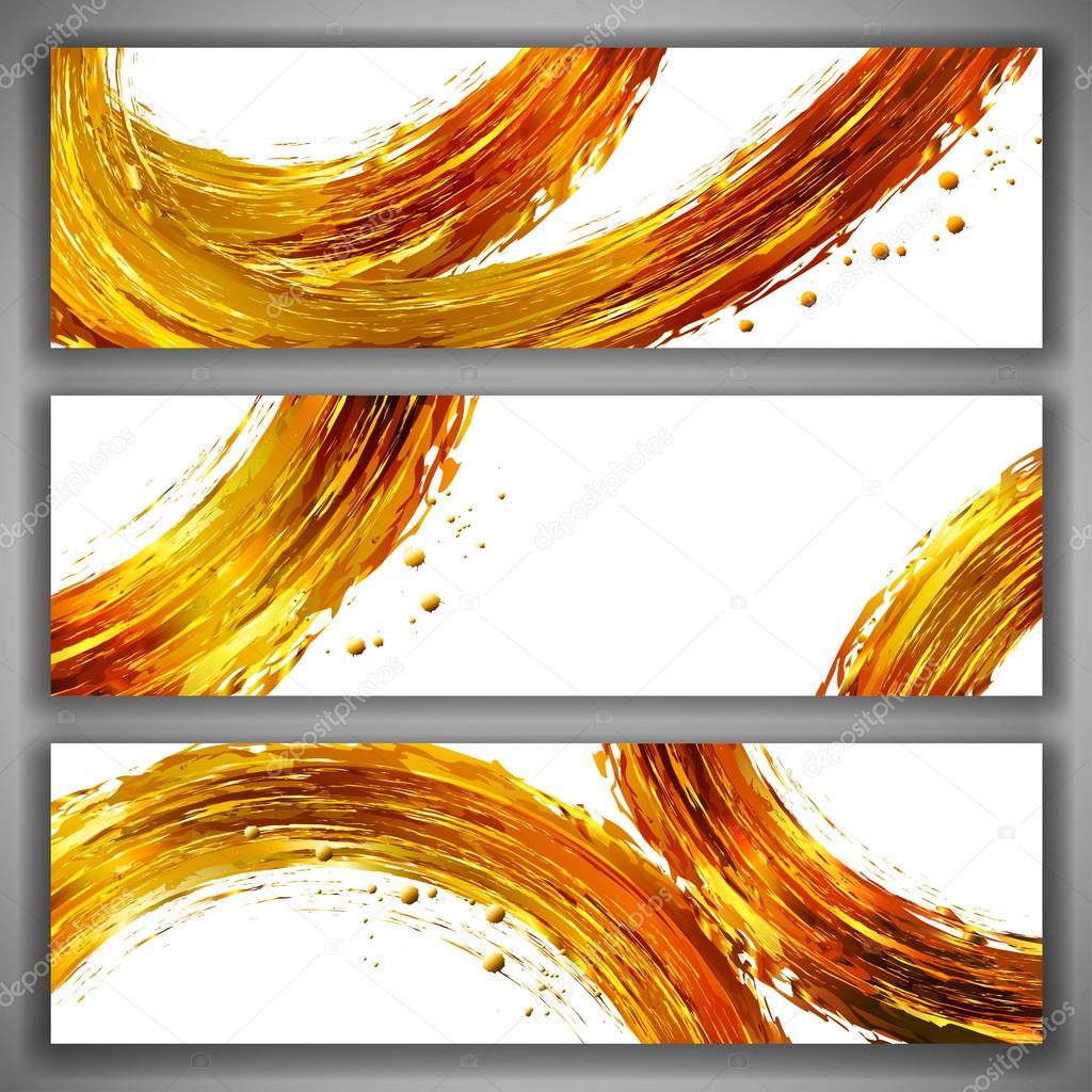 Set of abstract banners with golden brush strokes and splashes.