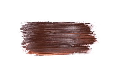 Beyaz üzerine izole edilmiş kahverengi boya fırça darbesi